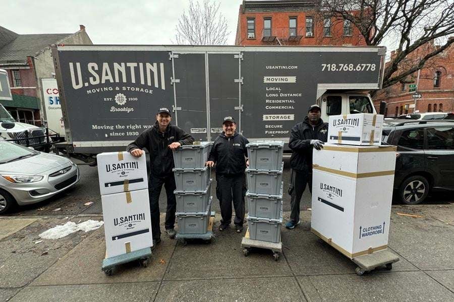 An individual with boxes providing moving services in New York City 