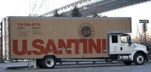 Truck of U.Santini moving on the roads of New York City 