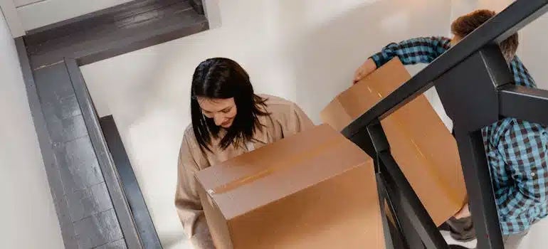 Girl packing boxes