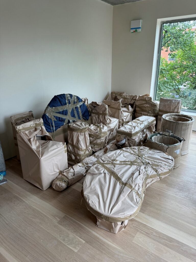 Group of packed furniture and equipment in Brooklyn, NY home