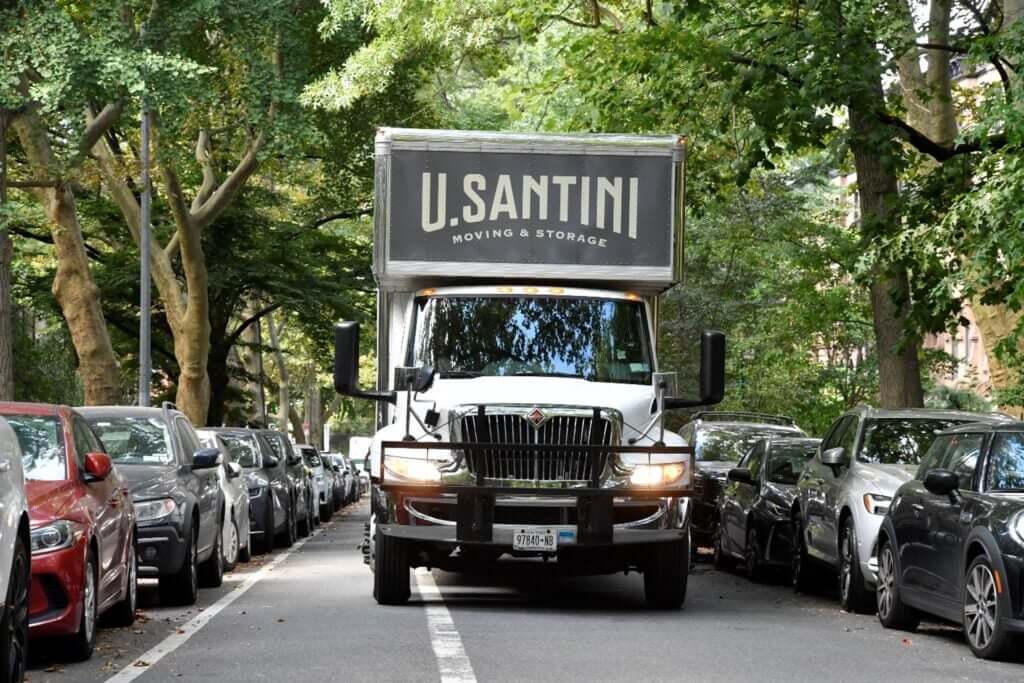 U.Santini going down street in Upper West Side, Manhattan
